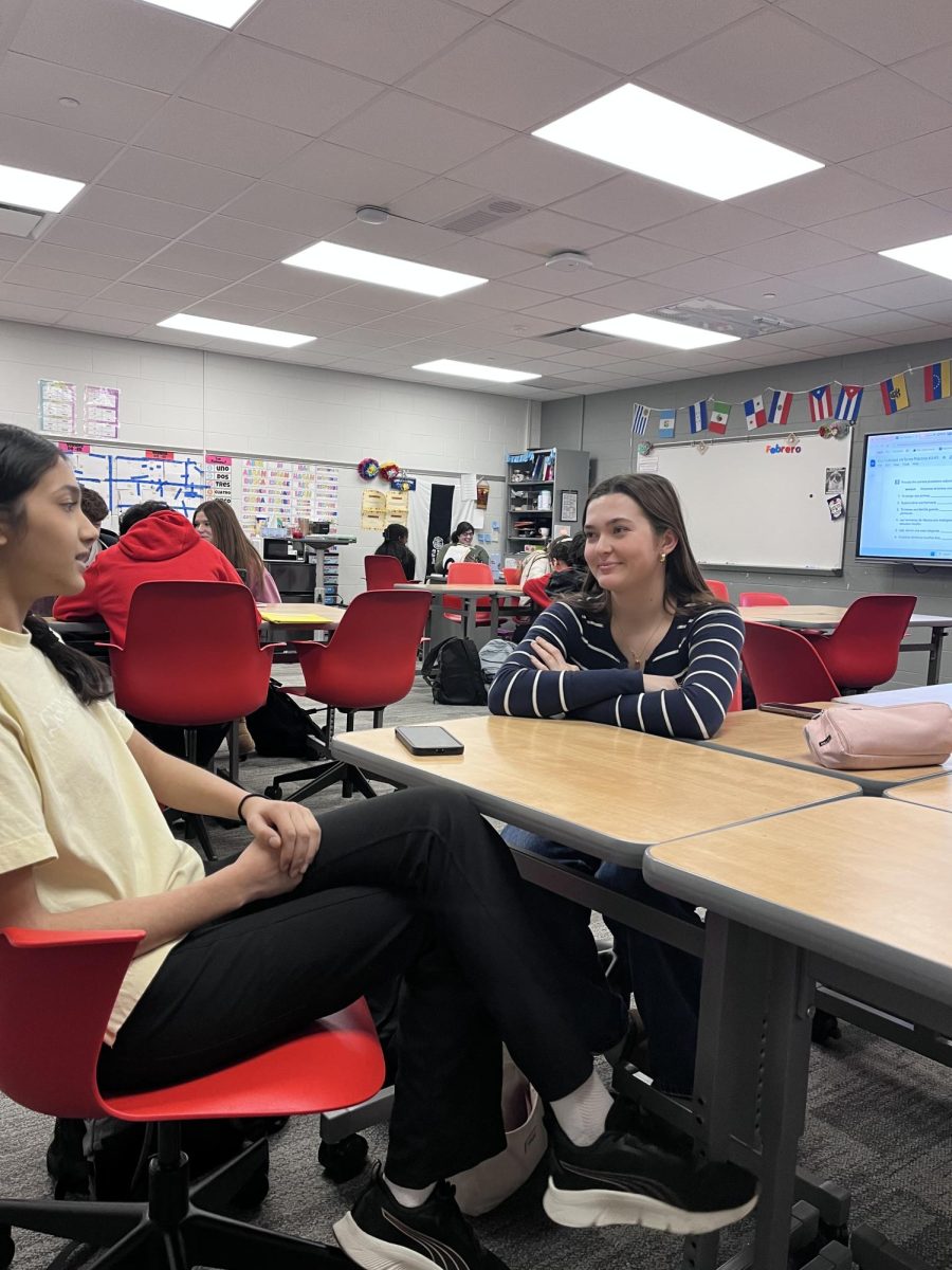 In Jessica Bonnin’s Spanish 3 Honors class, sophomore Malory Kemmerer practices for her speaking quiz. Students were expected to hold a conversation with Bonnin for a few minutes utilizing the tenses of present, preterit, and imperfect. “The most difficult part of a speaking quiz is making sure it all flows. Since English is wired into our brains, it takes a minute to process and so the conversation can tend to die down awkwardly between sentences,” Kemmerer said. “To prepare, I practice talking with my friends for the days leading up to the quiz and look through my notes for the vocab subject we’re talking about.”
