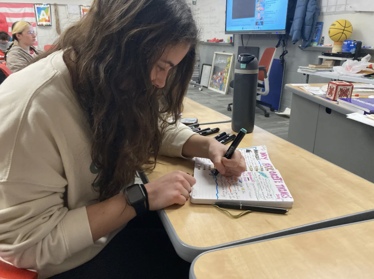 Sophomore Emily Thetford practices journaling in her study hall. “I like getting to look back and see what I was like at that time,” Thetford said. “Writing and coloring helps me feel at ease.”