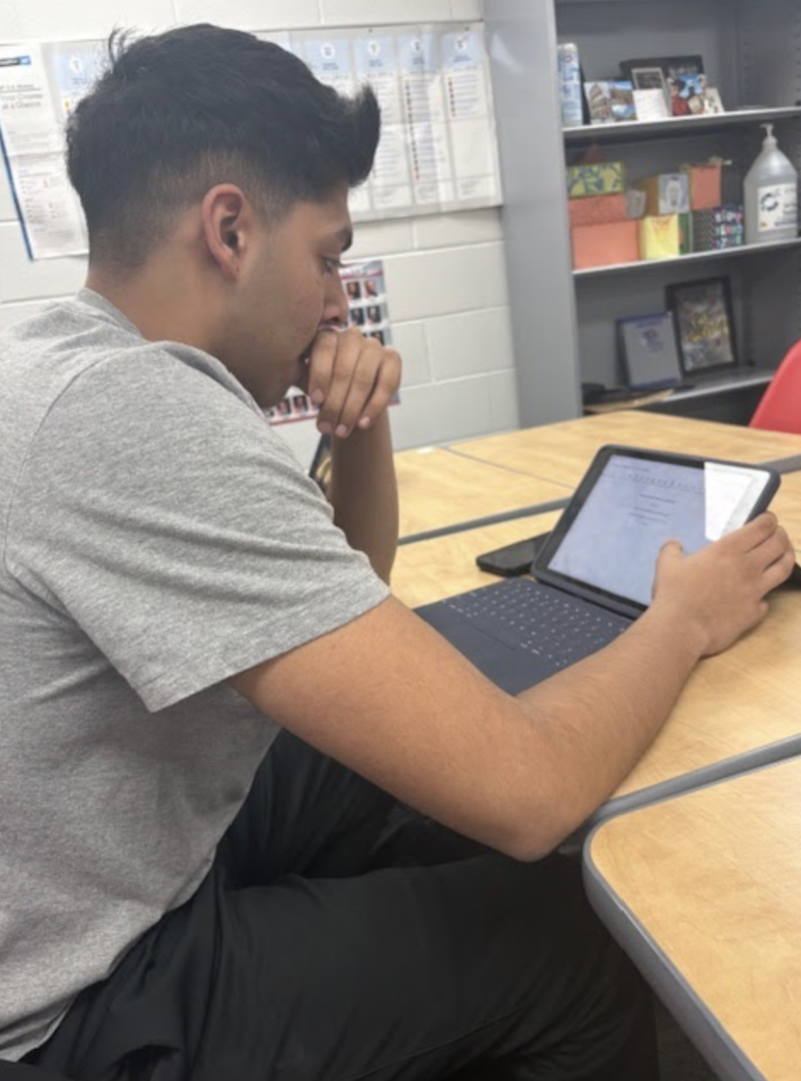 "Sitting in Josh Hart's AP US History class, Junior Raj Jain begins writing his CTA, or Critical Thinking Assignment, for the Vincennes University dual credit opportunity. In the Spring CTA, the students were expected write about three main time periods in American history and pick what they viewed as the most influential one. “The CTA is an assignment we had for our APUSH class where we research and analyze how a specific time period during American history affects the modern day,” Jain said. “I enjoy the assignment because it teaches you to think deeply about the different themes and events in the history of our country.”