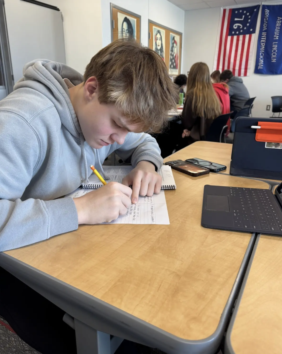 Junior Rhys Oliver dissects the amendments in the U.S. Constitution in Mr. Howe’s Government class. In class he has been learning about all the rights that given by the Constitution and how he can exercise them in the future. “I believe that learning all of our rights and how to use them right now gives us a benefit for the future depending on your job or career path down the road,” Oliver said. “It’s also important to know your rights so the people or the government can’t cheat you and walk all over you.”
