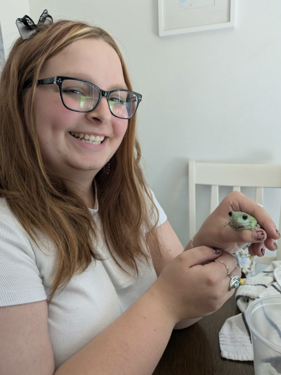 Junior Isabella Meyer holds her exotic pet 