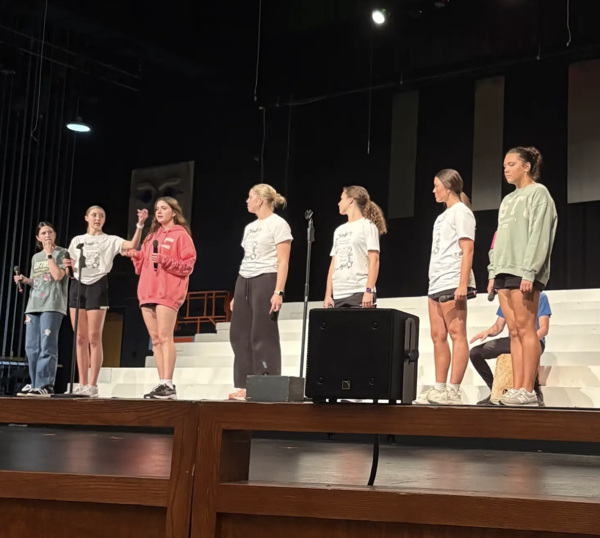 This week, members of Trojanettes, an a capella group, prepare for a performance in Spring Spec. This will be the last performance for all choirs as well as Trojanettes. "I love the spring show because it gives us a chance to preform together one last time, " Sophomore Audrey May said. "It also shows the audience how much we've improved over a year."