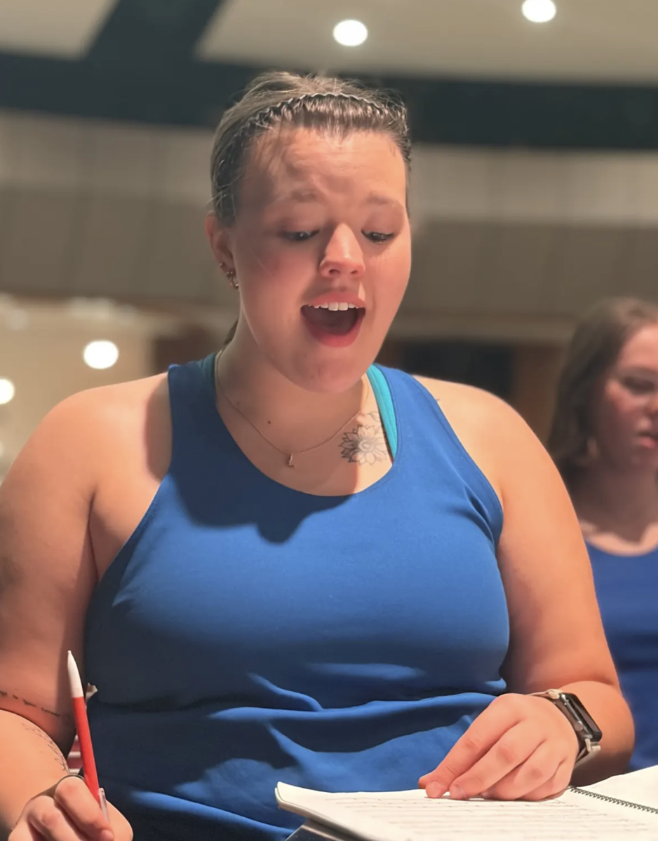 Senior Paige Gordon practices her vocal part for the opening number of the senior musical, SIX. The whole cast had rehearsal, and they went through the opening numbers of the show that they will perform in May. Right now students are learning lines and songs before fine toning and choreography is planned. “ I’m very excited for the show because it is so fun,” Gordon said. “With a small cast like this we all get individual attention, which is really helpful with having such a big role.”